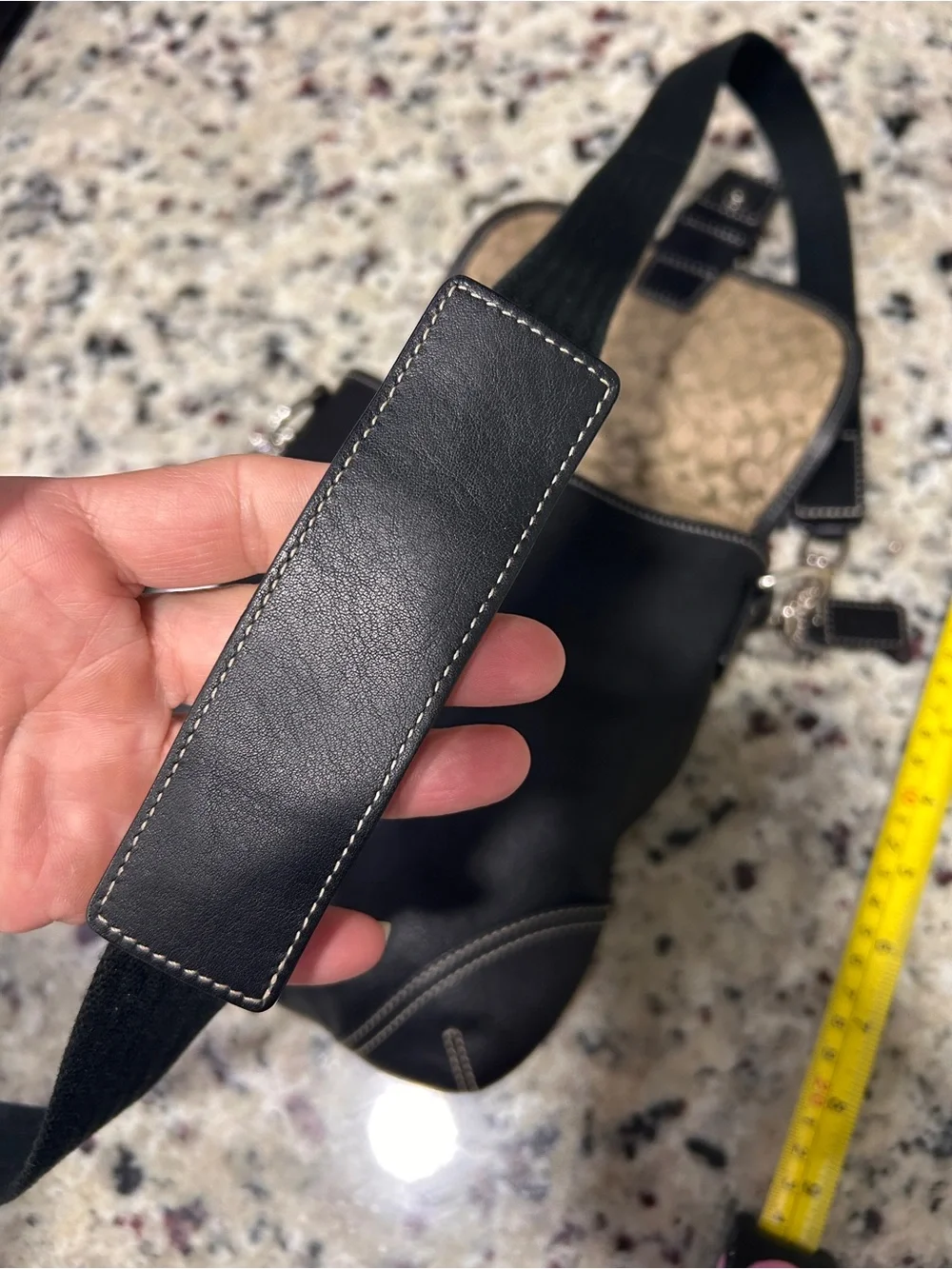 Classic Black Leather Backpack with Silver Buckle